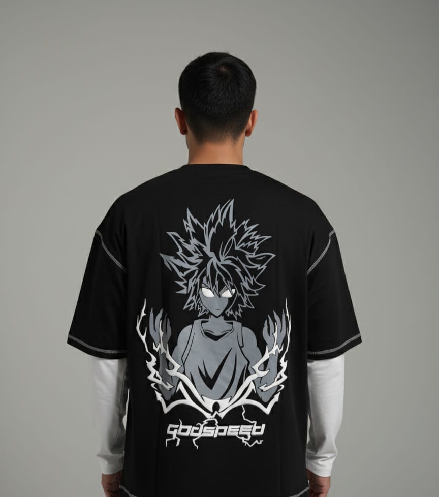 Person wearing a black t-shirt with a graphic design on the back against a gray background